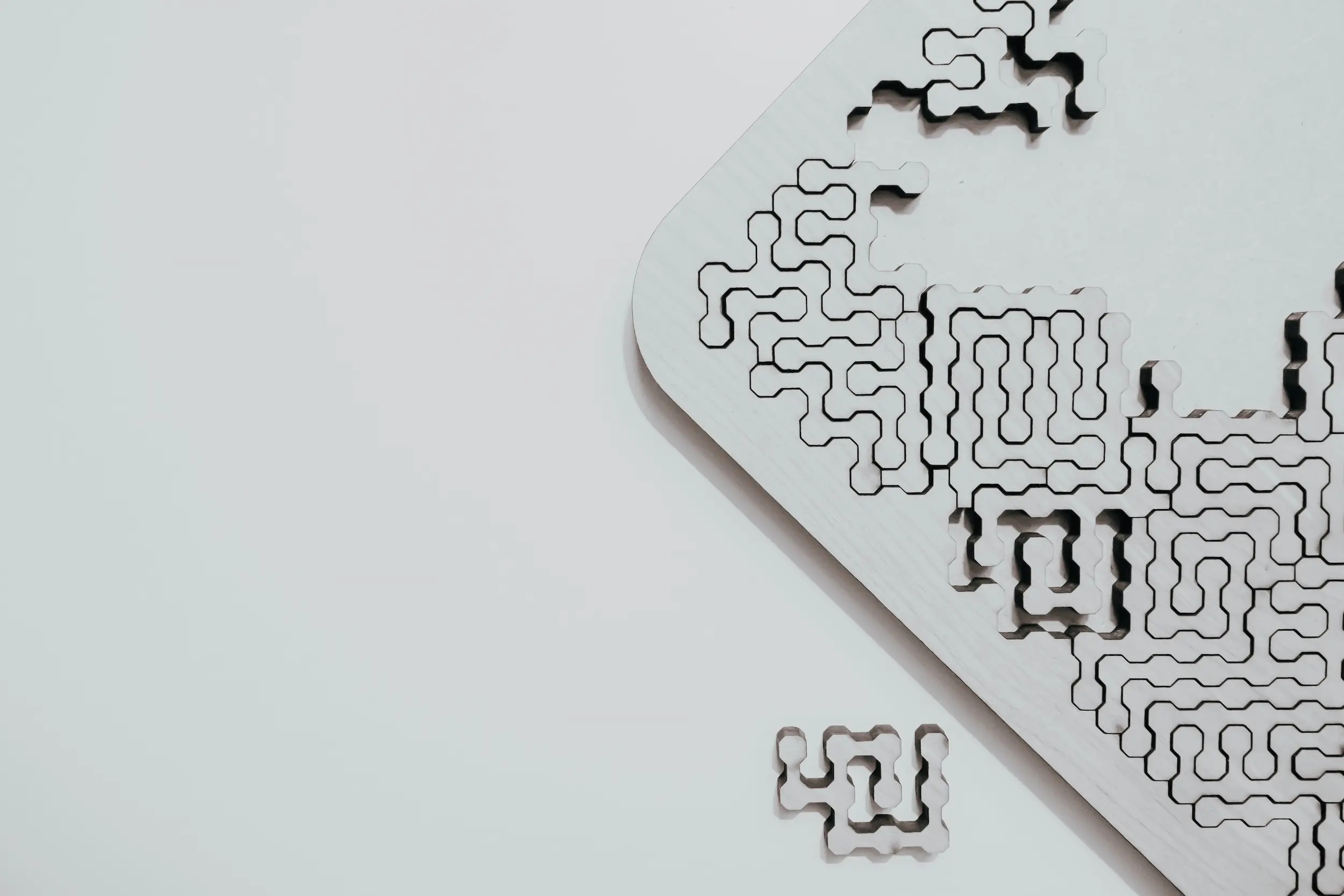 Photo of a jigsaw puzzle with shapes in complicated patterns